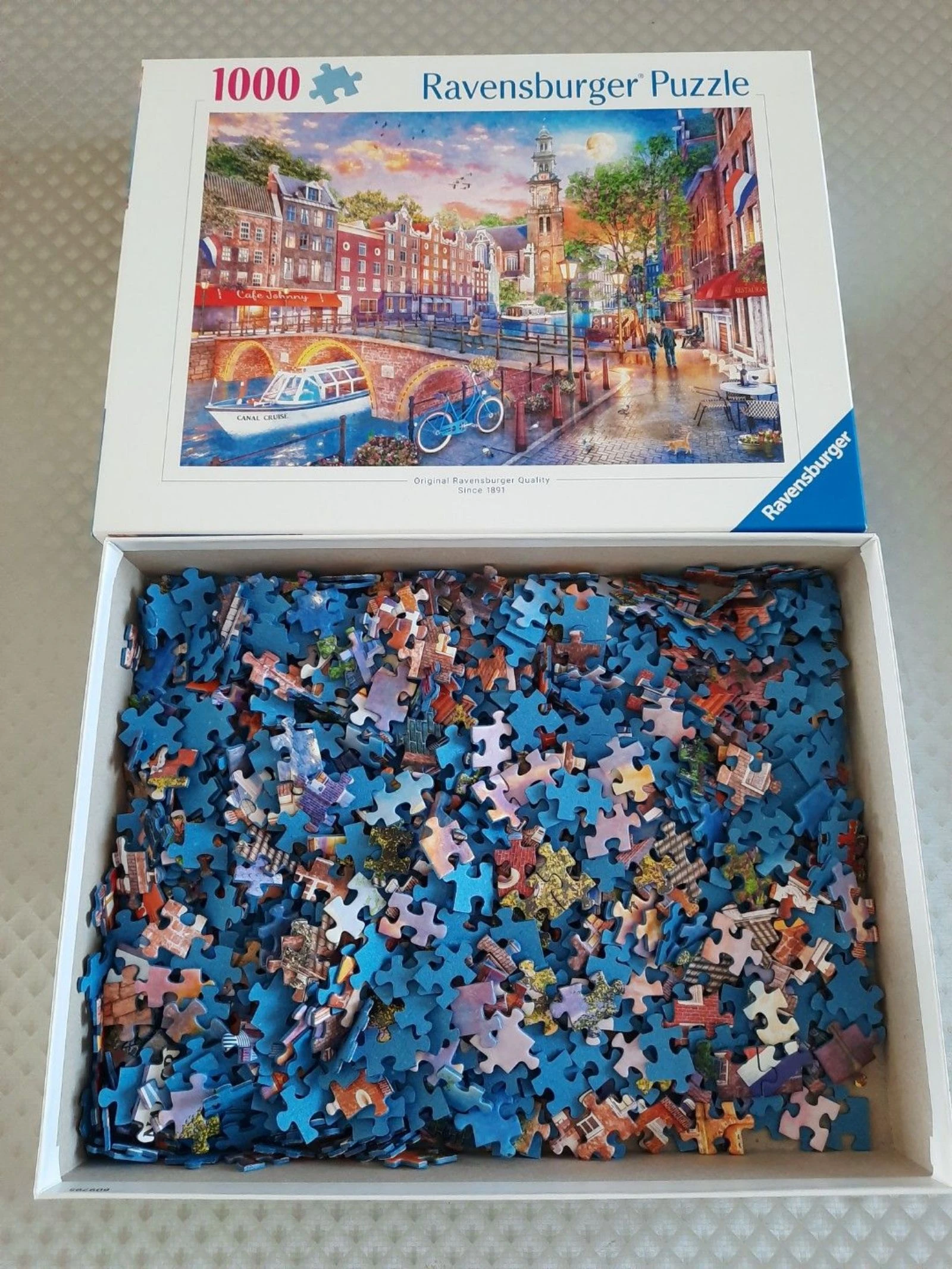 Quebra-cabeça Ravensburger 1000 peças – Canal de Amsterdã ao pôr do sol – Completo – photo 2